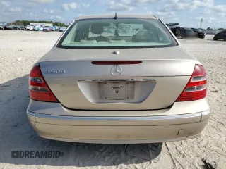 2005 Mercedes-Benz E 500 with VIN WDBUF70J35A696614, listed as a Copart auction lot 54342725 with 147,556 mi miles and Salvage Title. Bid and sale history available at DreamBid. Image 6.