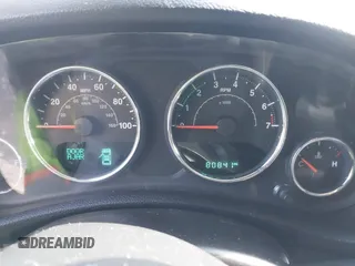 2015 Jeep Wrangler Unlimited Sahara with VIN 1C4BJWEGXFL506361, listed as a IAAI auction lot 41865418 with 80,841 mi miles. Bid and sale history available at carsss.com. Image 7.