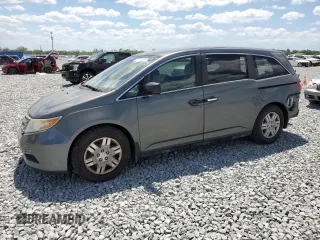 2013 Honda Odyssey LX with VIN 5FNRL5H26DB030757, listed as a Copart auction lot 51913635 with 104,654 mi miles and Salvage Title. Bid and sale history available at carsss.com. Image 1.