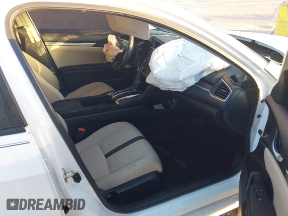 2019 Honda Civic LX with VIN 19XFC2F61KE014007, listed as a IAAI auction lot 41795070 with 64,259 mi miles and . Bid and sale history available at DreamBid. Image 5.