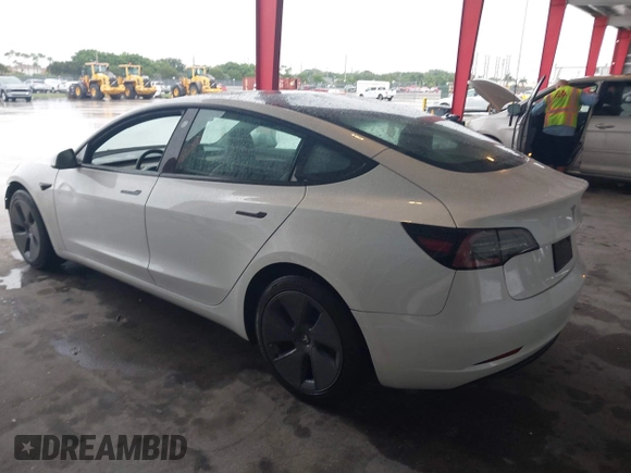 2023 Tesla Model 3 with VIN 5YJ3E1EA9PF548726, listed as a IAAI auction lot 42345157 with 30,647 mi miles and . Bid and sale history available at DreamBid. Image 3.