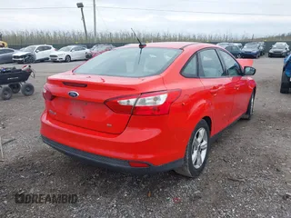 2014 Ford Focus SE with VIN 1FADP3F20EL379178, listed as a IAAI auction lot 42027323 with 142,872 mi miles and . Bid and sale history available at DreamBid. Image 4.