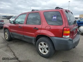 2005 Ford Escape XLT with VIN 1FMYU93105KD73059, listed as a Copart auction lot 53149615 with 143,739 mi miles and Salvage Title. Bid and sale history available at carsss.com. Image 2.