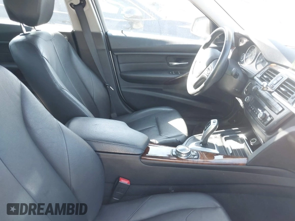 2014 BMW 3 Series 335i xDrive with VIN WBA3B9G52ENR91044, listed as a IAAI auction lot 41807408 with 200,000 mi miles and . Bid and sale history available at carsss.com. Image 5.