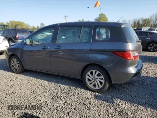 2014 Mazda 5 Sport с VIN JM1CW2BL2E0167630, выставлен на аукционе Copart как лот 54394195 с пробегом 79 034 миль миль и Списание • Salvage title. История ставок и продаж доступна на DreamBid. Изображение 2.