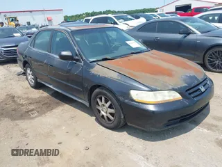 2002 Honda Accord SE with VIN 1HGCG56782A077935, listed as a IAAI auction lot 42404856 with 320,713 mi miles and . Bid and sale history available at DreamBid. Image 1.
