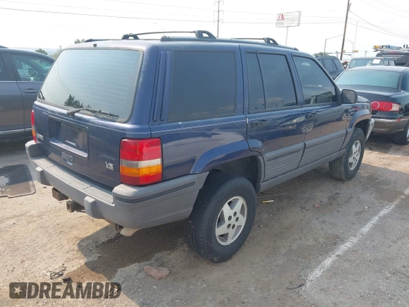 1994 Jeep Grand Cherokee Laredo z VIN 1J4GZ58Y7RC233746, wystawiony jako IAAI lot #42722206 z przebiegiem 196 875 mil mil oraz . Historia ofert i sprzedaży dostępna na DreamBid. Obrazek 4.