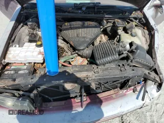 1995 Chevrolet Caprice z VIN 1G1BL52W7SR137278, wystawiony jako Copart lot #74446544 z przebiegiem Nie podano mil oraz Szkoda całkowita • Salvage title. Historia ofert i sprzedaży dostępna na DreamBid. Obrazek 12.