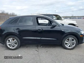 2018 Audi Q3 Premium z VIN WA1BCCFS8JR013032, wystawiony jako IAAI lot #41706173 z przebiegiem 111 402 mil mil oraz . Historia ofert i sprzedaży dostępna na DreamBid. Obrazek 13.