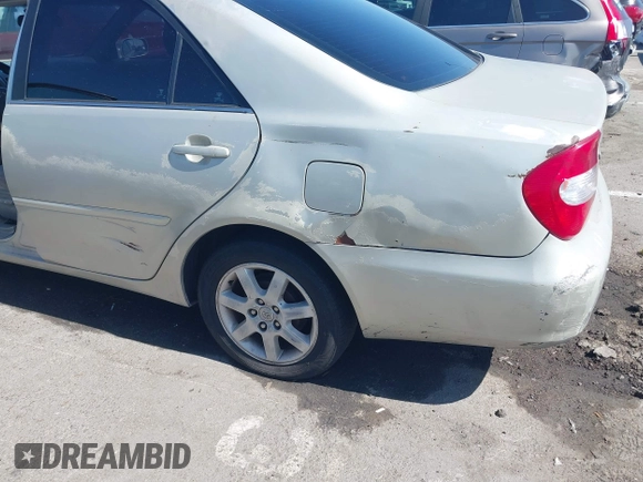 2004 Toyota Camry LE with VIN 4T1BE32K84U341747, listed as a IAAI auction lot 42701813 with 245,431 mi miles and . Bid and sale history available at DreamBid. Image 12.