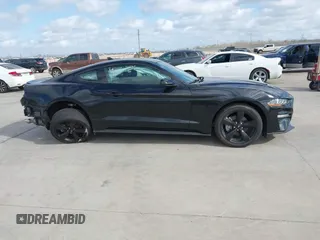 2021 Ford Mustang EcoBoost z VIN 1FA6P8TH2M5140071, wystawiony jako IAAI lot #41775674 z przebiegiem 20 184 mil mil oraz . Historia ofert i sprzedaży dostępna na DreamBid. Obrazek 13.