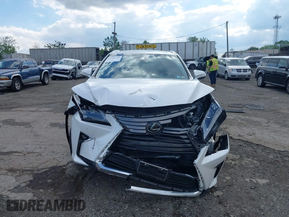 2019 Lexus RX 350 with VIN 2T2BZMCAXKC195457, listed as a IAAI auction lot 42203295 with 31,811 mi miles and . Bid and sale history available at DreamBid. Image 6.