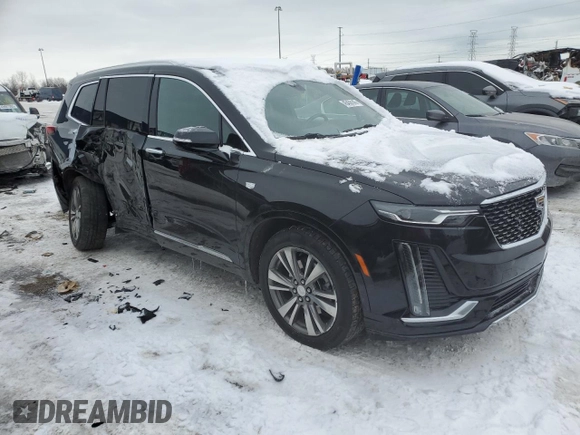 2021 Cadillac XT6 Premium Luxury with VIN 1GYKPDRS3MZ165049, listed as a Copart auction lot 45456145 with 57,112 mi miles and Salvage title. Bid and sale history available at DreamBid. Image 4.