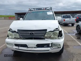 2004 Lexus LX 470 z VIN JTJHT00W043543915, wystawiony jako IAAI lot #41902858 z przebiegiem 110 454 mil mil oraz . Historia ofert i sprzedaży dostępna na DreamBid. Obrazek 13.