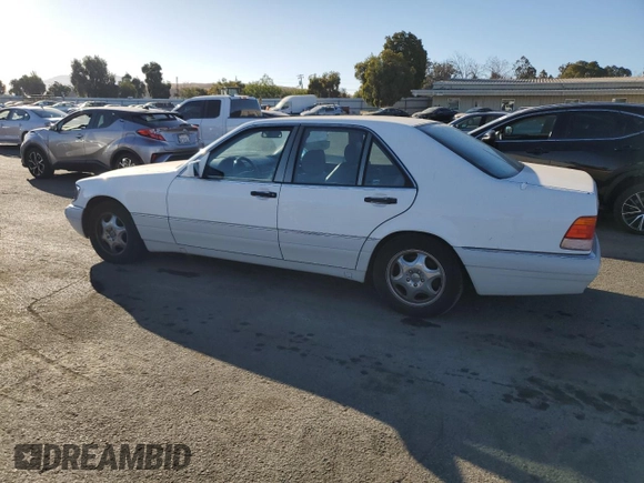 1995 Mercedes-Benz S 320 with VIN WDBGA32E8SA252144, listed as a Copart auction lot 77053484 with 126,534 mi miles and Clean Title. Bid and sale history available at DreamBid. Image 2.