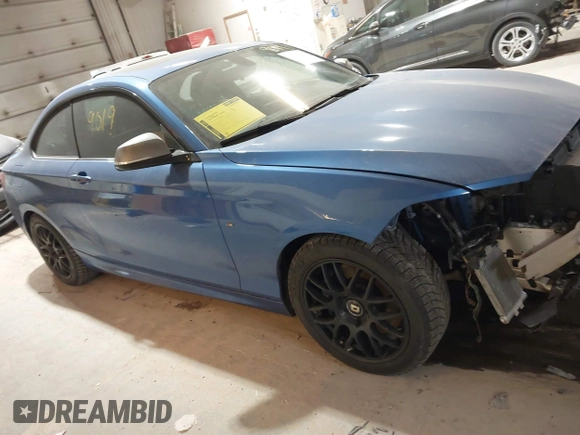 2014 BMW 2 Series M235i with VIN WBA1J7C59EV253309, listed as a IAAI auction lot 41509019 with 63,782 mi miles and . Bid and sale history available at carsss.com. Image 12.