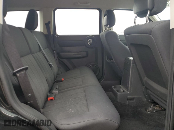 2011 Dodge Nitro Heat with VIN 1D4PT4GK7BW597557, listed as a Copart auction lot 58973335 with 180,958 mi miles and Salvage title. Bid and sale history available at DreamBid. Image 10.