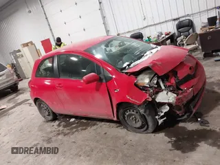 2009 Toyota Yaris with VIN JTDJT903695262292, listed as a IAAI auction lot 41636204 with 157,986 mi miles. Bid and sale history available at carsss.com. Image 13.