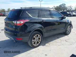 2017 Ford Escape SE with VIN 1FMCU0GDXHUB56573, listed as a IAAI auction lot 41694558 with 145,902 mi miles. Bid and sale history available at carsss.com. Image 4.