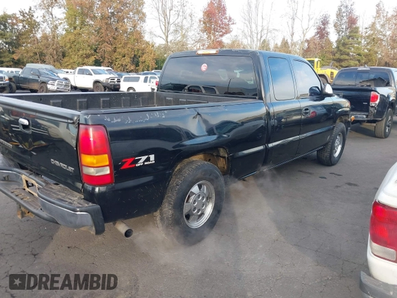 2002 Chevrolet Silverado 1500 LT with VIN 1GCEK19T42E150069, listed as a IAAI auction lot 41401949 with 105,099 mi miles. Bid and sale history available at carsss.com. Image 4.
