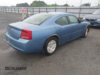 2007 Dodge Charger with VIN 2B3KA43RX7H676602, listed as a IAAI auction lot 42187317 with 323,520 mi miles and . Bid and sale history available at carsss.com. Image 4.