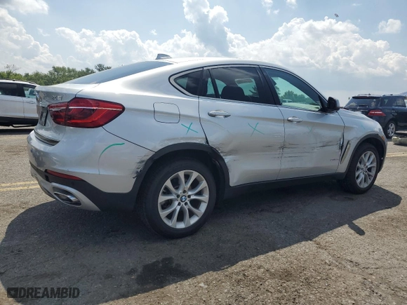2019 BMW X6 sDrive35i with VIN 5UXKU0C57K0S97385, listed as a Copart auction lot 69103994 with 44,186 mi miles and Salvage Title. Bid and sale history available at carsss.com. Image 3.