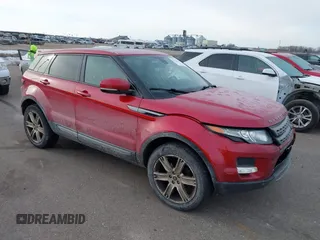 2013 Land Rover Range Rover Evoque Pure Premium z VIN SALVR2BGXDH725770, wystawiony jako IAAI lot #41227331 z przebiegiem 169 096 mil mil oraz . Historia ofert i sprzedaży dostępna na DreamBid. Obrazek 1.