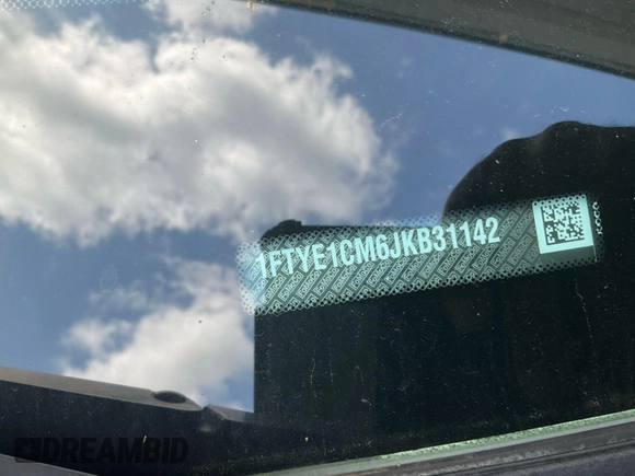 2018 Ford Transit with VIN 1FTYE1CM6JKB31142, listed as a IAAI auction lot 42785382 with 79,664 mi miles and . Bid and sale history available at DreamBid. Image 2.