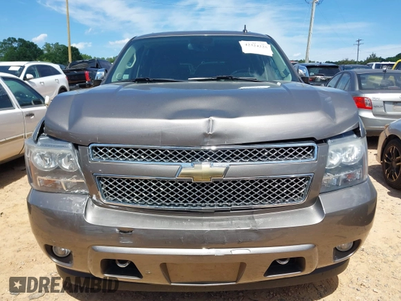 2011 Chevrolet Suburban LTZ with VIN 1GNSKKE3XBR394436, listed as a IAAI auction lot 42324225 with 132,871 mi miles and . Bid and sale history available at DreamBid. Image 12.