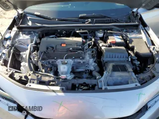 2023 Honda Civic Sport z VIN 19XFL2H80PE001402, wystawiony jako Copart lot #52409015 z przebiegiem 16 079 mil mil oraz Szkoda całkowita • Salvage title. Historia ofert i sprzedaży dostępna na DreamBid. Obrazek 11.