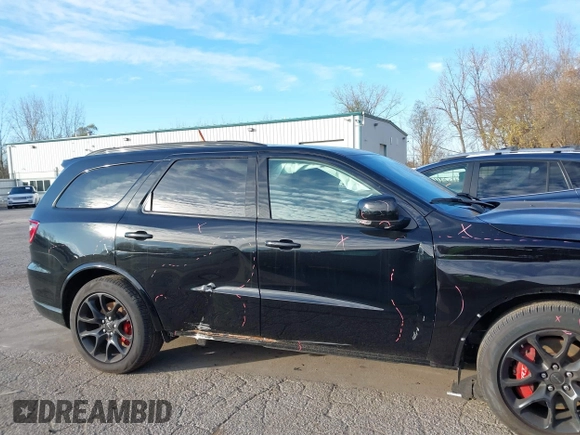 2023 Dodge Durango SRT 392 Premium with VIN 1C4SDJGJ9PC693449, listed as a IAAI auction lot 40796697 with 4,633 mi miles and . Bid and sale history available at DreamBid. Image 13.