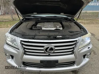 2013 Lexus LX 570 with VIN JTJHY7AX9D4100920, listed as a Copart auction lot 54273215 with 229,058 mi miles and Clean Title. Bid and sale history available at DreamBid. Image 7.