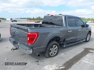 2021 Ford F-150 XL with VIN 1FTEW1CPXMFD00974, listed as a IAAI auction lot 41093772 with 112,890 mi miles and . Bid and sale history available at carsss.com. Image 4.