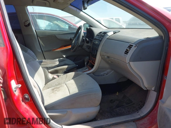 2009 Toyota Corolla with VIN 1NXBU40E09Z049359, listed as a IAAI auction lot 42041746 with 211,167 mi miles. Bid and sale history available at carsss.com. Image 5.