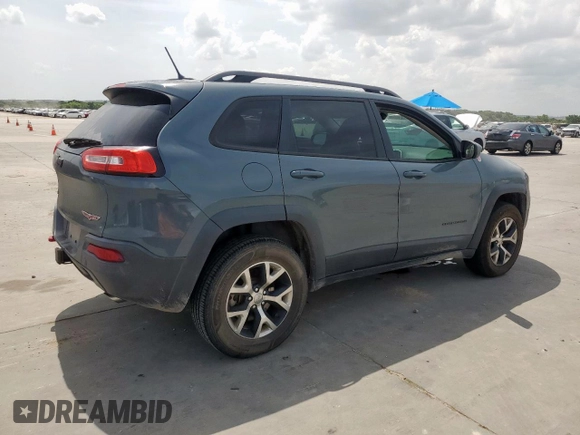 2014 Jeep Cherokee Trailhawk with VIN 1C4PJMBS0EW185737, listed as a Copart auction lot 63463015 with 199,983 mi miles and Clean title. Bid and sale history available at DreamBid. Image 3.