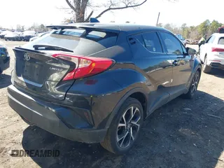 2019 Toyota C-HR XLE with VIN JTNKHMBXXK1019814, listed as a IAAI auction lot 41884485 with 53,101 mi miles. Bid and sale history available at carsss.com. Image 4.