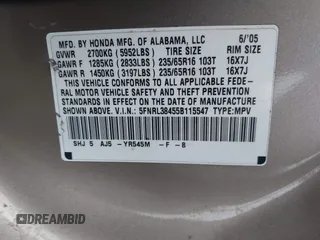 2005 Honda Odyssey EX with VIN 5FNRL38455B115547, listed as a IAAI auction lot 41911371 with 184,150 mi miles. Bid and sale history available at carsss.com. Image 9.