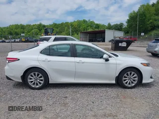 2019 Toyota Camry LE z VIN 4T1B11HKXKU786639, wystawiony jako IAAI lot #42212321 z przebiegiem 82 843 mil mil oraz . Historia ofert i sprzedaży dostępna na DreamBid. Obrazek 13.