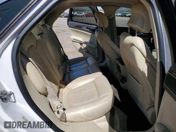 2013 Lincoln MKZ z VIN 3LN6L2GKXDR814615, wystawiony jako Copart lot #65654335 z przebiegiem 100 510 mil mil oraz Szkoda całkowita • Salvage title. Historia ofert i sprzedaży dostępna na DreamBid. Obrazek 10.