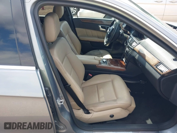 2013 Mercedes-Benz E 400 Sport with VIN WDDHF9FB6DA741371, listed as a IAAI auction lot 42141161 with 208,676 mi miles and . Bid and sale history available at DreamBid. Image 5.