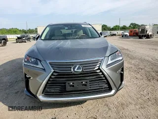 2019 Lexus RX 350 z VIN 2T2ZZMCA9KC129707, wystawiony jako Copart lot #52202615 z przebiegiem 69 868 mil mil oraz Szkoda całkowita • Salvage title. Historia ofert i sprzedaży dostępna na DreamBid. Obrazek 11.