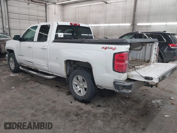 2015 Chevrolet Silverado 1500 LT with VIN 1GCVKREC5FZ175730, listed as a IAAI auction lot 41569809 with 200,755 mi miles. Bid and sale history available at carsss.com. Image 3.