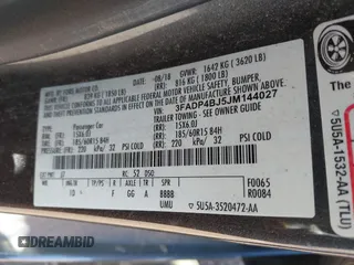 2018 Ford Fiesta SE with VIN 3FADP4BJ5JM144027, listed as a IAAI auction lot 41977656 with 34,217 mi miles. Bid and sale history available at carsss.com. Image 9.