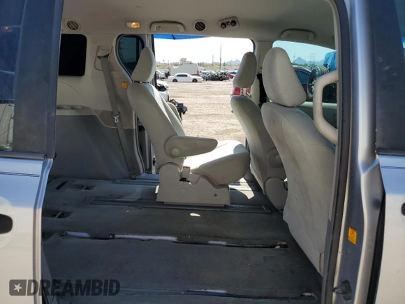 2012 Toyota Sienna with VIN 5TDZK3DC8CS246285, listed as a Copart auction lot 61676185 with 114,700 mi miles and Salvage title. Bid and sale history available at DreamBid. Image 11.