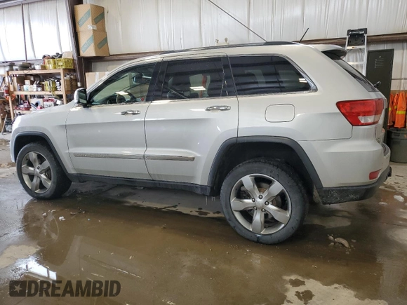 2013 Jeep Grand Cherokee Overland with VIN 1C4RJFCG2DC622345, listed as a Copart auction lot 49640325 with 192,144 mi miles and Salvage Title. Bid and sale history available at carsss.com. Image 2.