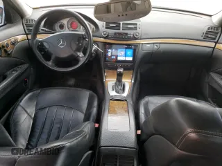 2005 Mercedes-Benz E-Class 5.5L AMG with VIN WDBUF76J05A730404, listed as a Copart auction lot 78168554 with 154,164 mi miles and Clean Title. Bid and sale history available at carsss.com. Image 8.