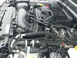 2025 Jeep Wrangler Willys z VIN 1C4PJXDN0SW555394, wystawiony jako IAAI lot #43321086 z przebiegiem 5 204 mil mil oraz . Historia ofert i sprzedaży dostępna na DreamBid. Obrazek 21.