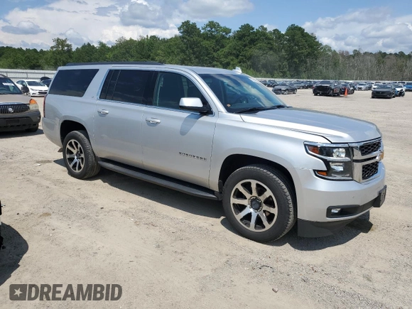 2019 Chevrolet Suburban LT with VIN 1GNSKHKC3KR286568, listed as a Copart auction lot 60929504 with 79,798 mi miles and Clean Title. Bid and sale history available at DreamBid. Image 4.