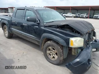 2005 Dodge Dakota SLT with VIN 1D7HW48NX5S140082, listed as a IAAI auction lot 42738619 with 197,603 mi miles and . Bid and sale history available at DreamBid. Image 1.