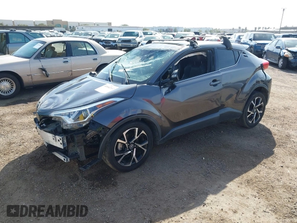 2019 Toyota C-HR XLE with VIN JTNKHMBX3K1018567, listed as a IAAI auction lot 41602932 with 213,386 mi miles and . Bid and sale history available at DreamBid. Image 2.